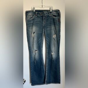 Distressed Blue Boot Cut Silver Jeans